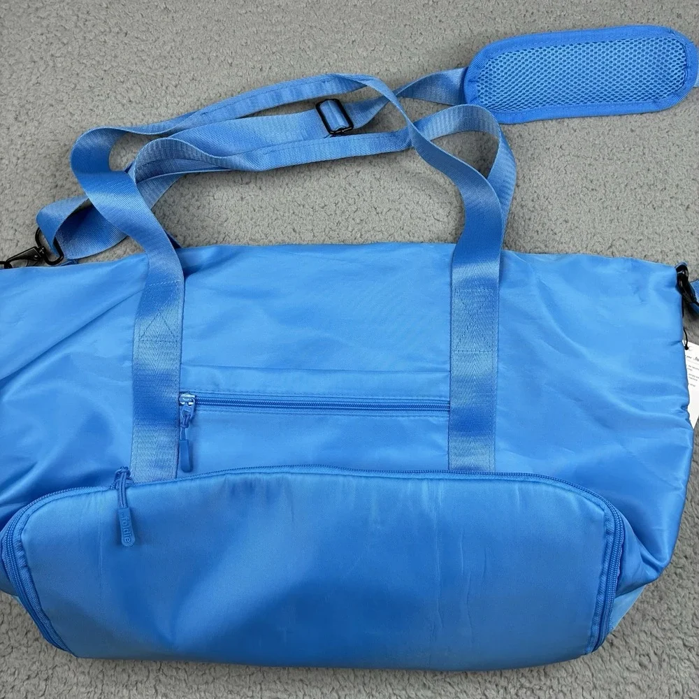 The Foldie 40L Travel Bag Carry On Expandable Azure Blue Weekender Tote NWT